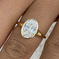 Oval Cut Bezel Set Proposal Ring