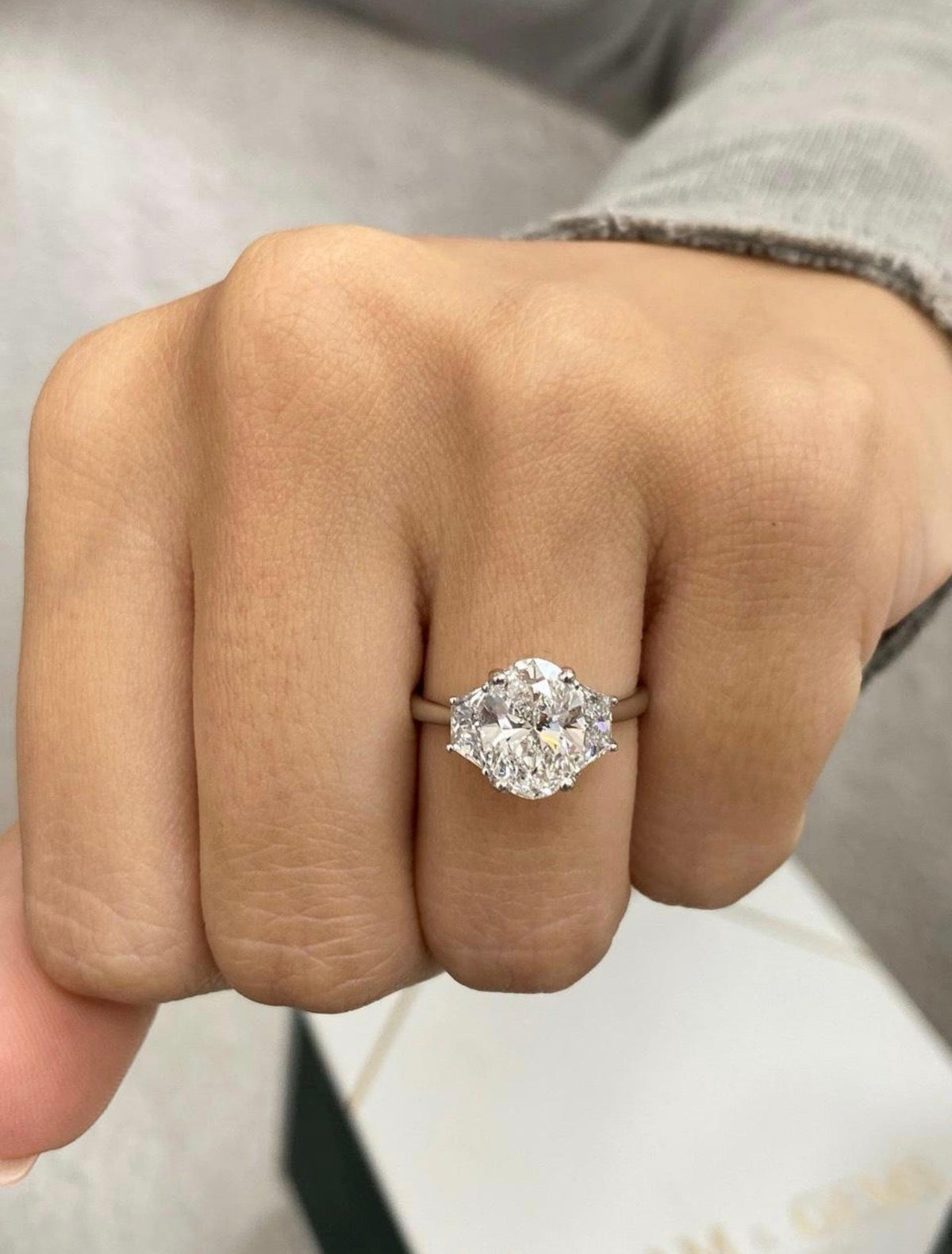 2ct Oval Cut Ring with Trapezoid